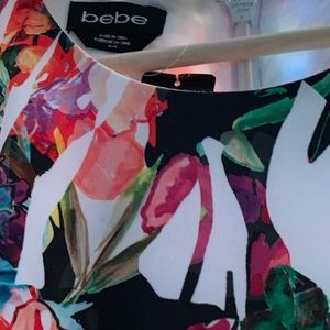 Sleeveless floral dress. A line